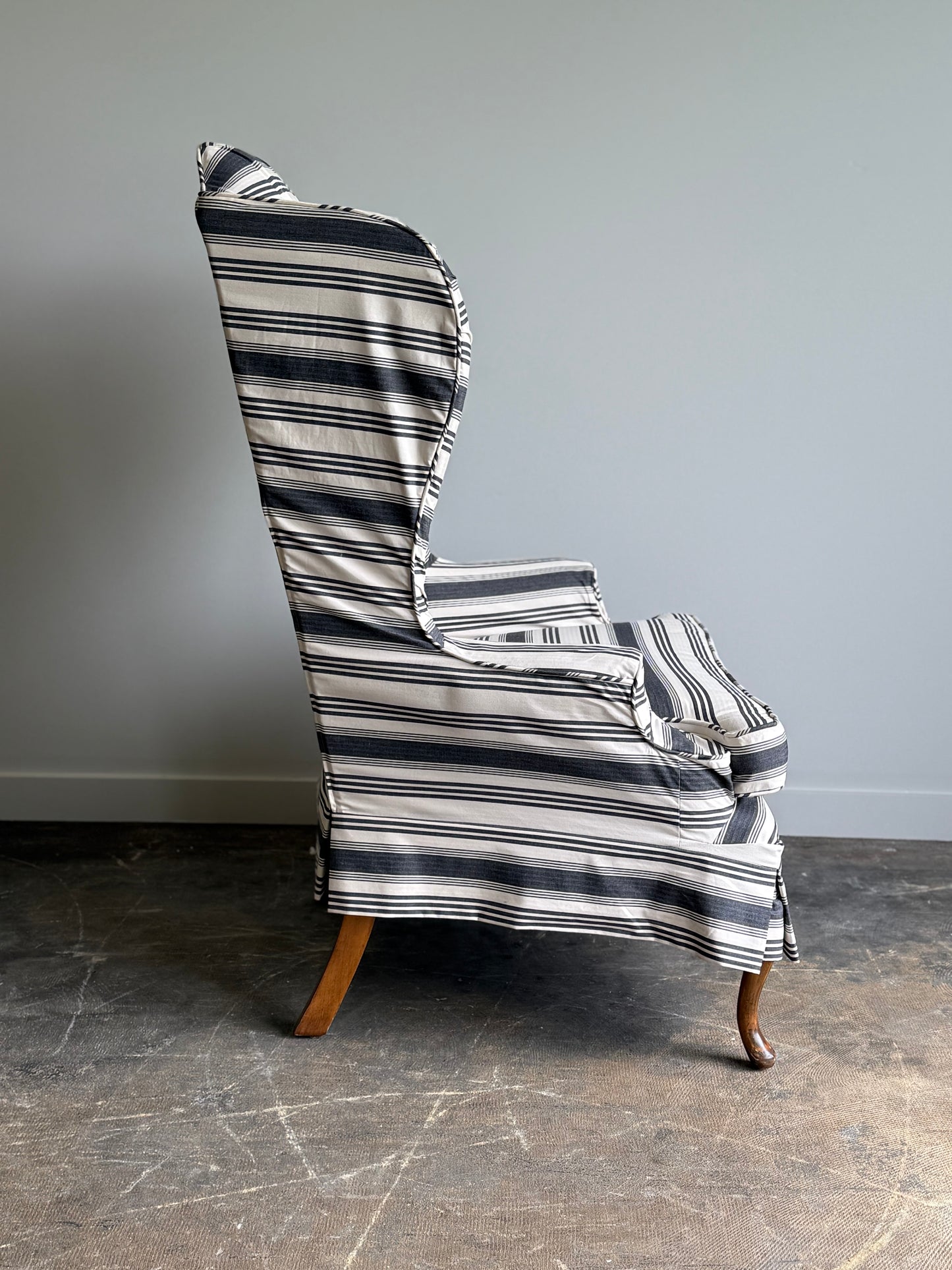 A Striped Queen Anne Style Wingback Chair