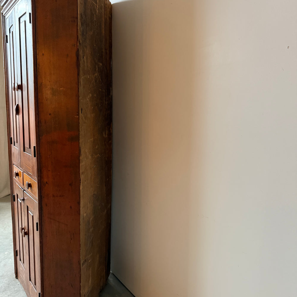 
                  
                    Early Primitive Corner Cupboard with Raised Panel Doors
                  
                