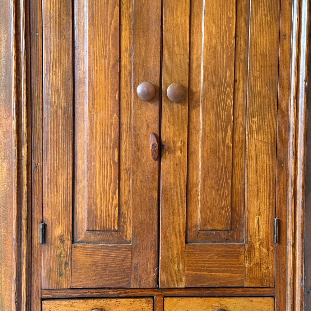 
                  
                    Early Primitive Corner Cupboard with Raised Panel Doors
                  
                