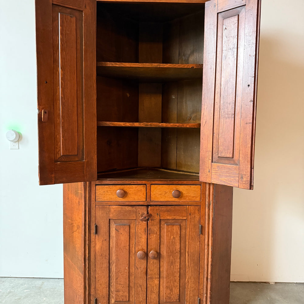 
                  
                    Early Primitive Corner Cupboard with Raised Panel Doors
                  
                