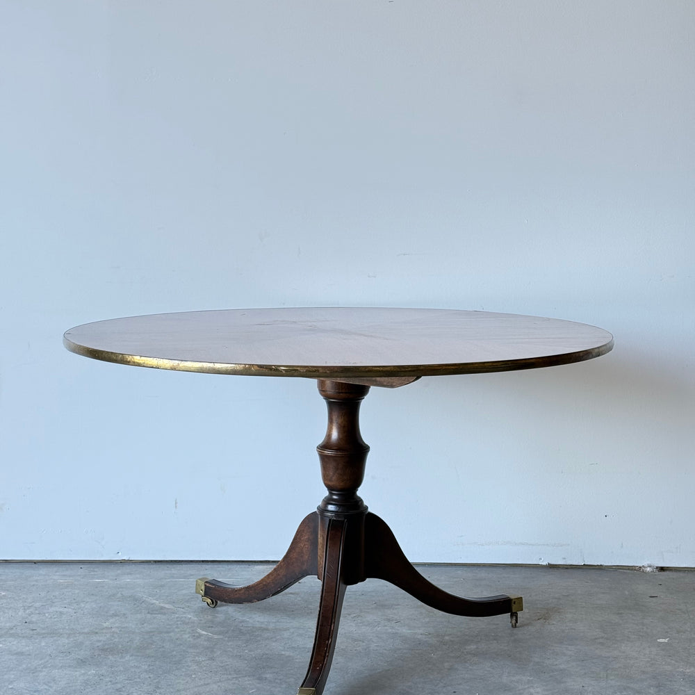 
                  
                    Regency Style Round Table on Casters w/ Brass Trim
                  
                