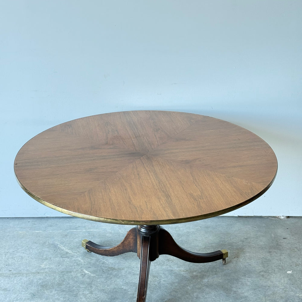 
                  
                    Regency Style Round Table on Casters w/ Brass Trim
                  
                