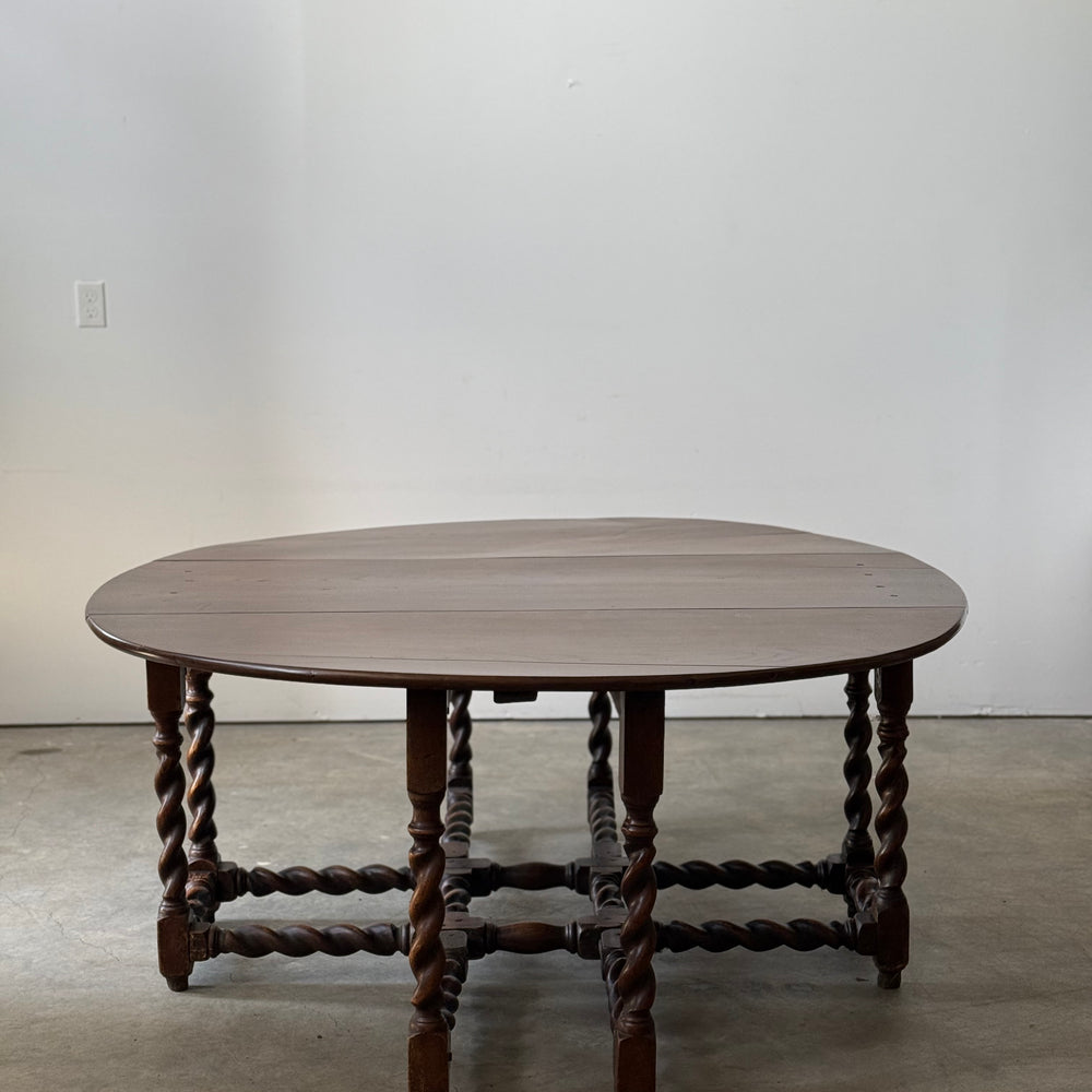 
                  
                    Jacobean Oak Double Swing Leg Drop Leaf Table
                  
                