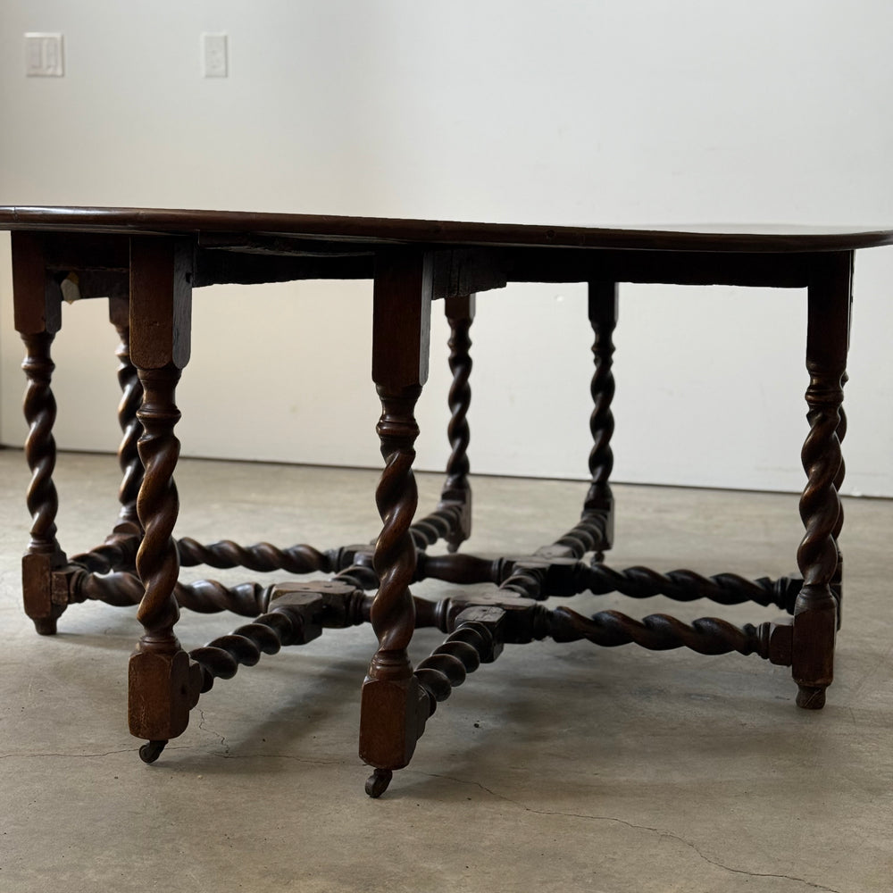 
                  
                    Jacobean Oak Double Swing Leg Drop Leaf Table
                  
                
