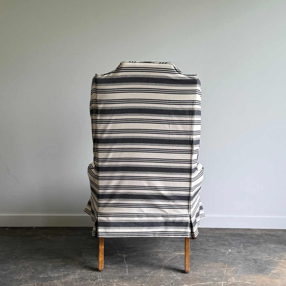 
                  
                    A Striped Queen Anne Style Wingback Chair
                  
                