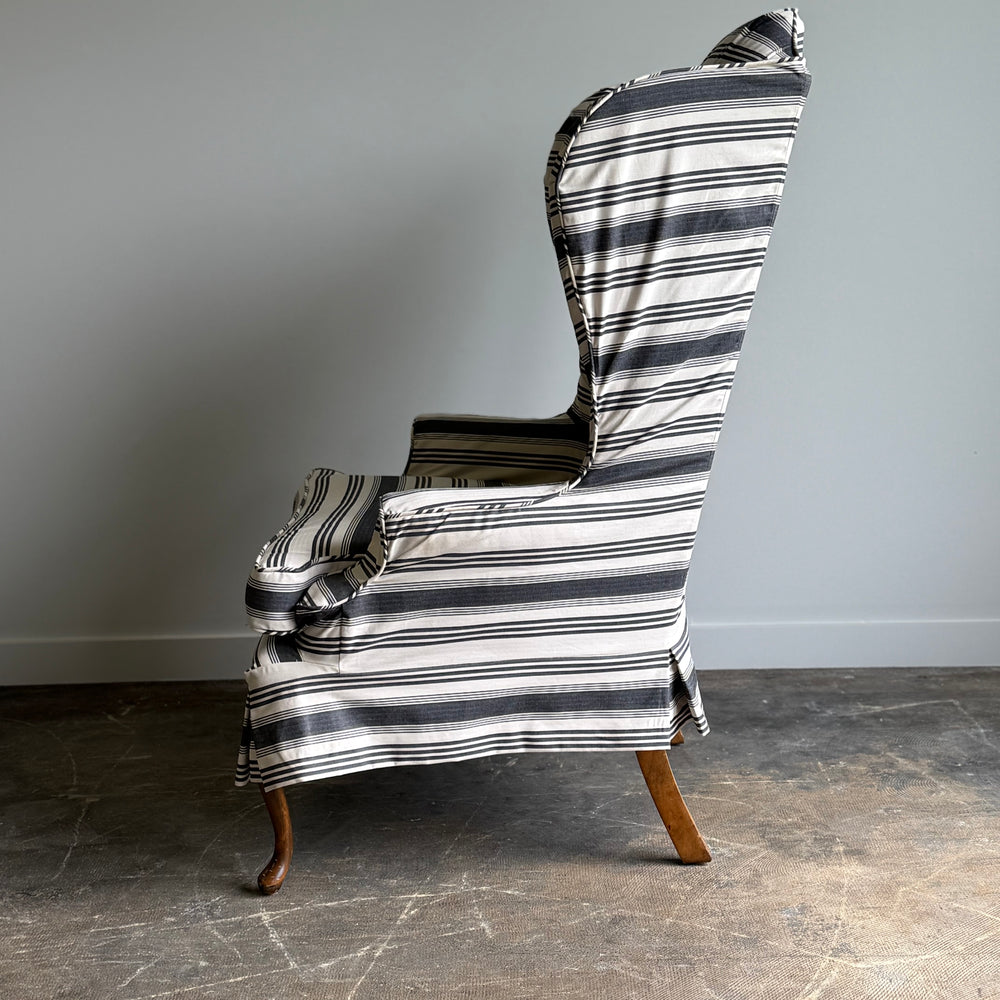 
                  
                    A Striped Queen Anne Style Wingback Chair
                  
                