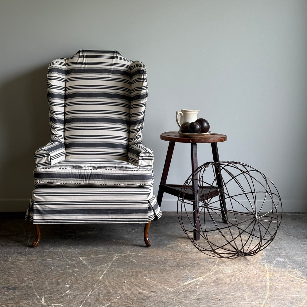 
                  
                    A Striped Queen Anne Style Wingback Chair
                  
                