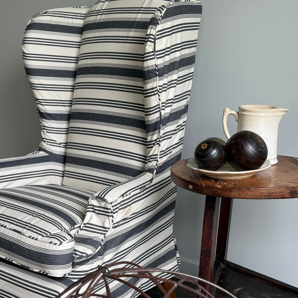 
                  
                    A Striped Queen Anne Style Wingback Chair
                  
                